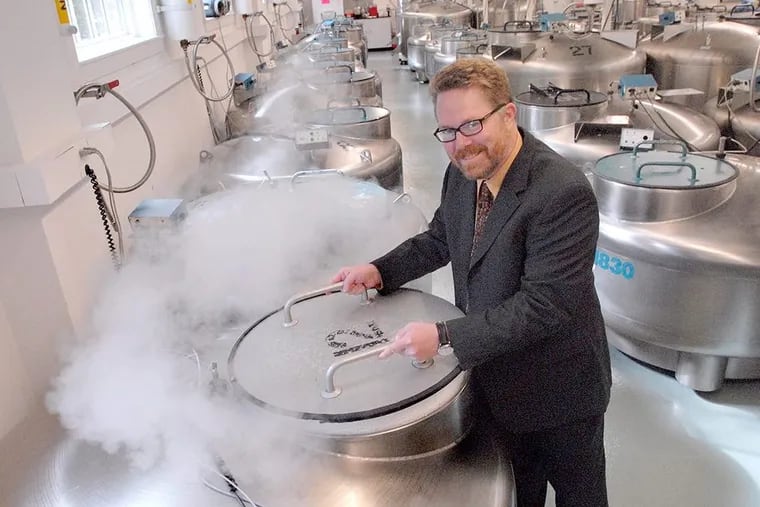 Michael Christman stands amid nitrogen tanks of cell lines at Coriell Institute soon after he became president and CEO in 2007