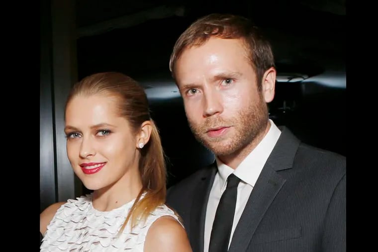 Teresa Palmer and Mark Weber attend the DETAILS Hollywood Mavericks Party on Thursday, Nov. 29, 2012 in Los Angeles. (Todd Williamson/Invision for Details Magazine/AP Images)