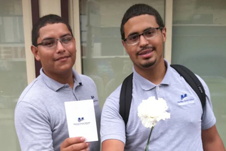 Luis Sandoval (left) and Jose Nazario were among Mastery students apologizing for fellow students' roles in flash-mob violence. (Annette John-Hall / Staff)