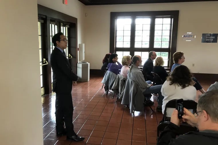 Democrat Andy Kim, running for Congress in New Jersey's Third Congressional District, prepares to talk about getting corporate interests out of Washington D.C. The event was held one floor below incumbent Rep. Tom MacArthur's offices.