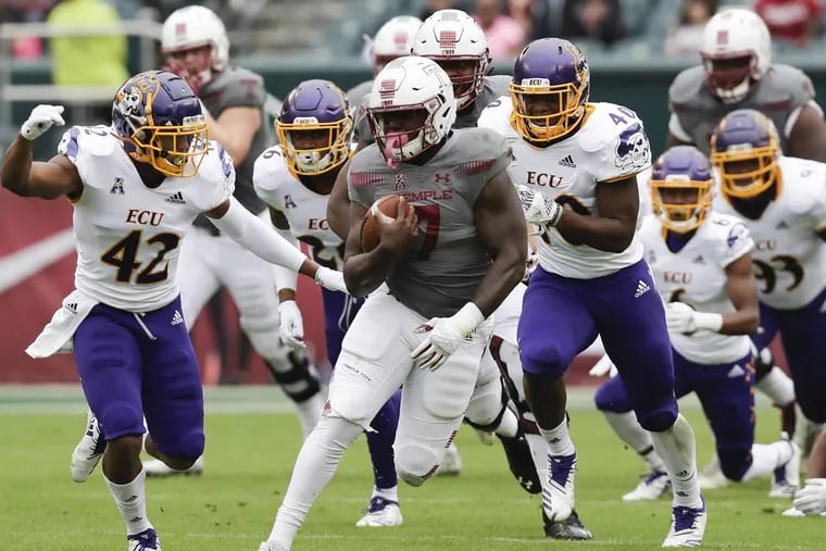 Temple running back Ryquell Armstead runs with football past East Carolina defenders on Saturday, October 6, 2018. YONG KIM / Staff Photographer