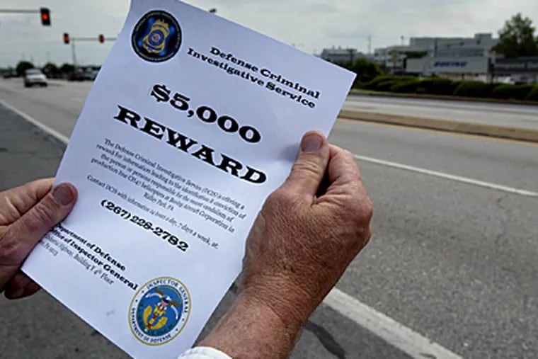 A copy of a reward poster distributed last week to employees at the Boeing Plant Thursday in Ridley Park Pa., where Chinook helicopters were vandalized. (AP)