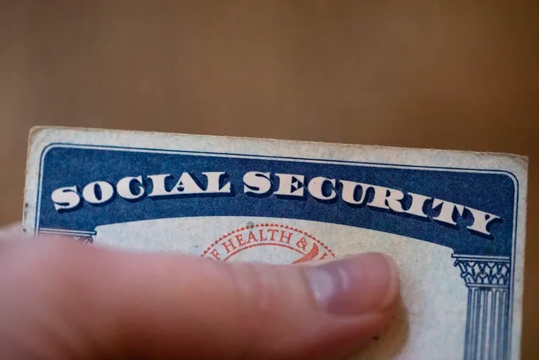 A Social Security card is displayed on Oct. 12, 2021, in Tigard, Ore. Millions of Social Security recipients will soon learn just how high a boost they'll get in their benefits next year. The increase to be announced on Thursday, Oct. 13, 2022, expected to be the highest in 40 years, is fueled by record high inflation and is meant to help cover the higher cost of food, fuel and other goods and services.