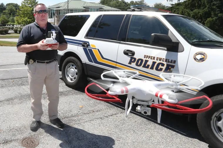 Upper Uwchlan Township police chief said he's heard no complaints about his department's drone. He says lots of residents have drones of their own. Detective Thomas Jones operates their drone. Monday, August 3, 2015. (STEVEN M. FALK / Staff Photographer)