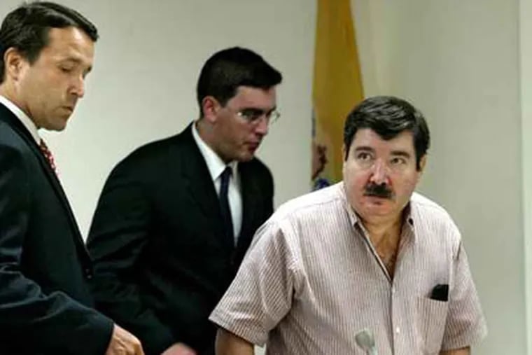Frank Nastasi,right, in court in 2004 in Camden County after pleading guilty to driving his car into the Mt Ephraim McDonalds resulting in the death of three workers.  (David M Warren / Staff Photographer)