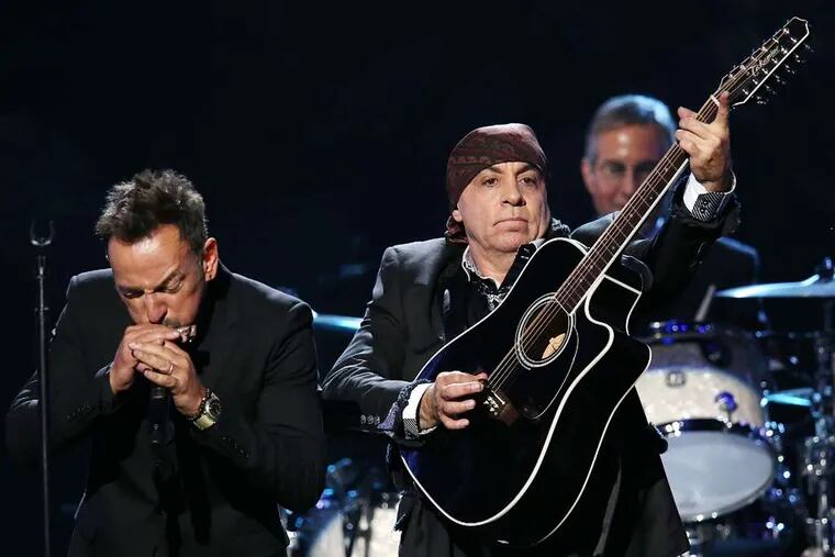 Bruce Springsteen (left) and inductee Steven Van Zandt performing at the April event.