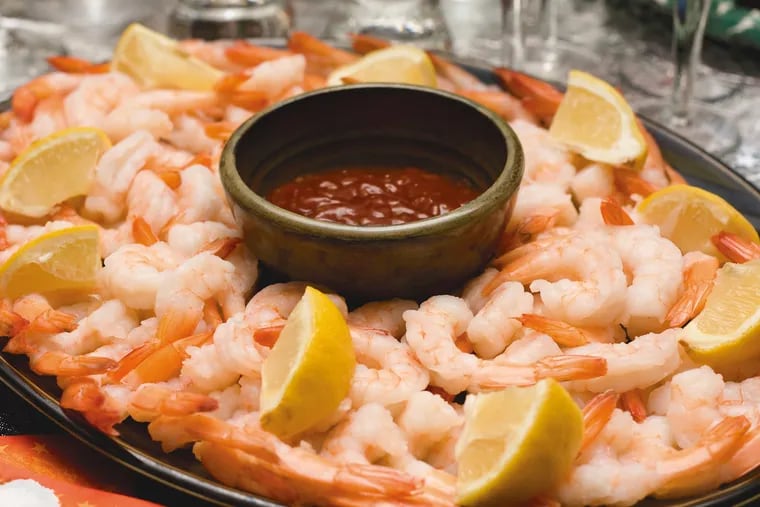 Much of the shrimp on holiday trays this season was processed by slaves and indentured servants in Thailand before being imported to the United States.