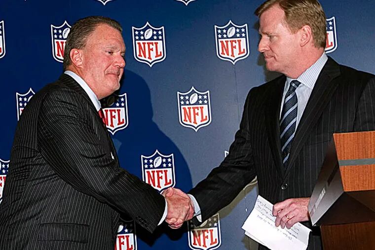 Colts owner Jim Irsay and NFL commissioner Roger Goodell. (John Amis/AP file photo)
