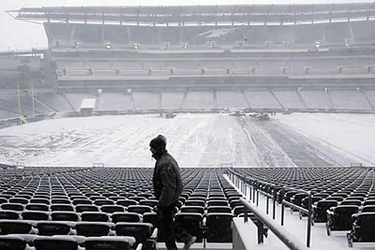Lincoln Financial Field was covered in snow throughout the day and night yesterday. (Yong Kim/Staff Photographer)