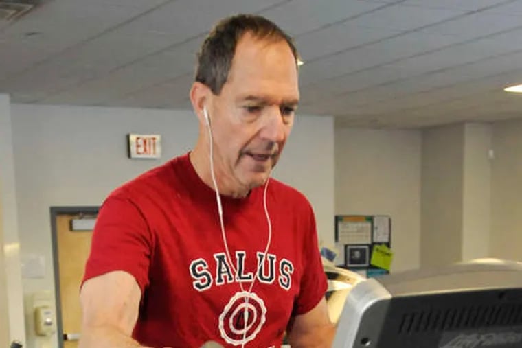 Mike Mittelman, head of Salus University in Elkins Park, at his daily workout. &quot;Salus&quot; means health and well-being.