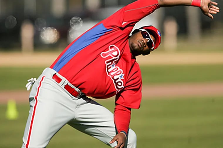 Phillies' minor leaguer Domonic Brown stretches during spring training
workouts at Bright House Field. (Yong Kim / Staff Photographer)
