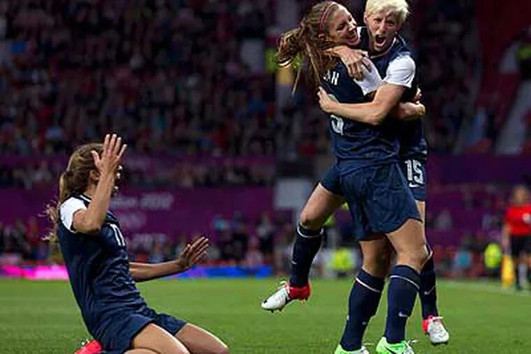 Alex Morgan (center) scored the winning goal as the United States topped Canada, 4-3. (Jon Super/AP)