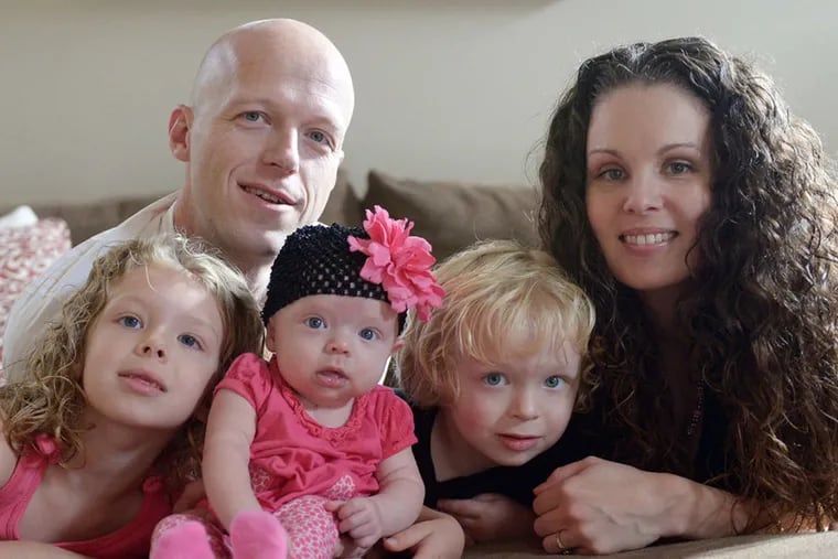 Mark and Megan Short in a 2014 family portrait with their children (from left) Lianna, Willow, and Mark.