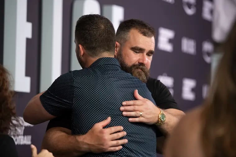 Jason Kelce hugs Eagles head coach Nick Sirianni as he arrives at the premier of Jason Kelce’s documentary at Suzanne Roberts Theater in Philadelphia on Friday, Sept. 9, 2023.