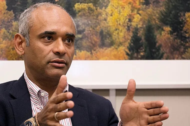 In this Wednesday, March 26, 2014 photo, Chet Kanojia, the founder and CEO of Aereo, speaks during an interview with The Associated Press, in New York. The future of Aereo, an online service that provides over-the-air TV channels, hinges on a battle with broadcasters that goes before the U.S. Supreme Court in late April 2014. (AP Photo/Mark Lennihan)