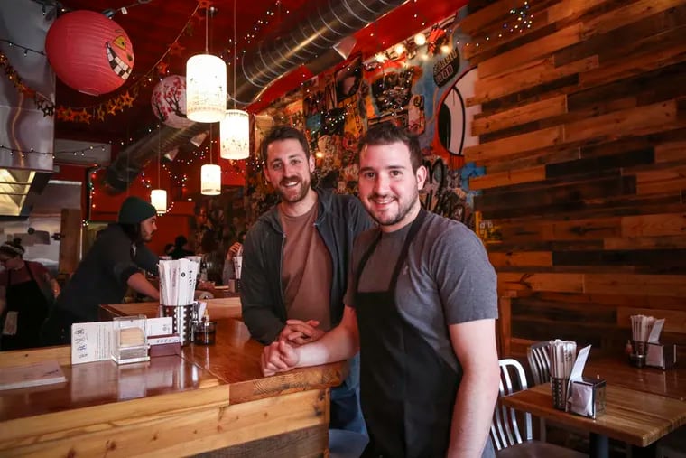Shawn Darragh (left) and chef Ben Puchowitz at CheU Noodle Bar in 2014.