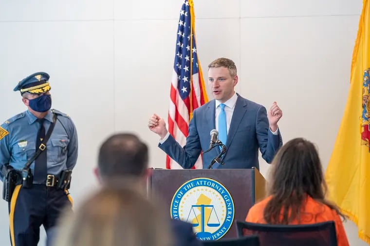 Acting New Jersey Attorney General Andrew Bruck announces the arrest of gang members for trafficking illegal weapons, including assault rifles and ghost guns.