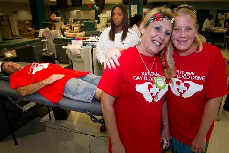 Friends Janis Harris (left) and Deidre Allen of Bridesburg section of Philadelphia were at the Red Cross donation center at 7th and Spring Garden on Friday July 11, 2014 to donate blood during the National Gay Blood Drive. Janis has a gay son and Deidre a brother, and both are unable to donate because of their sexual orientation. ( ALEJANDRO A. ALVAREZ / STAFF PHOTOGRAPHER )
