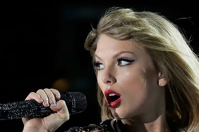 Taylor Swift tied for seven Grammy nominations . . .
