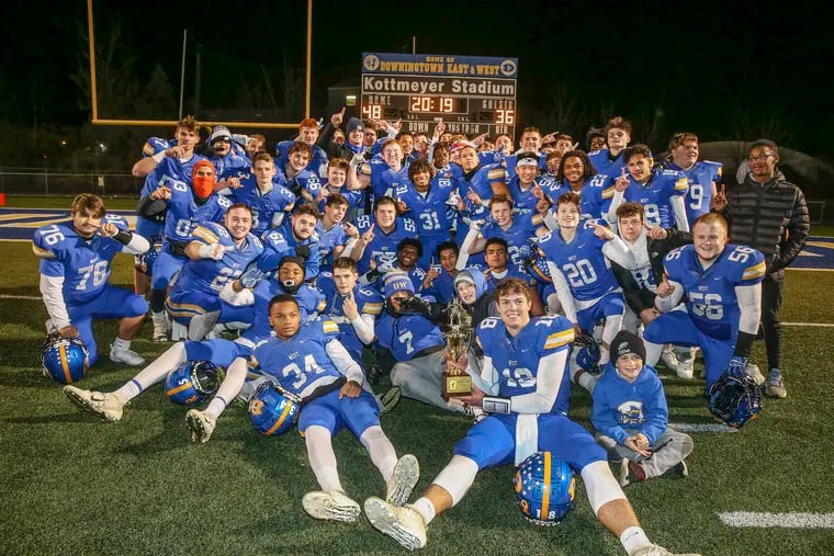 Downingtown West High School players celebrate winning the District 1, Class 6A title in 2019. The PIAA on Wednesday approved plans for postseason football in 2020.