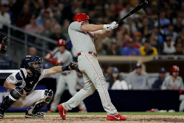 Jay Bruce watches his grand slam hit during the fifth inning against the San Diego Padres.