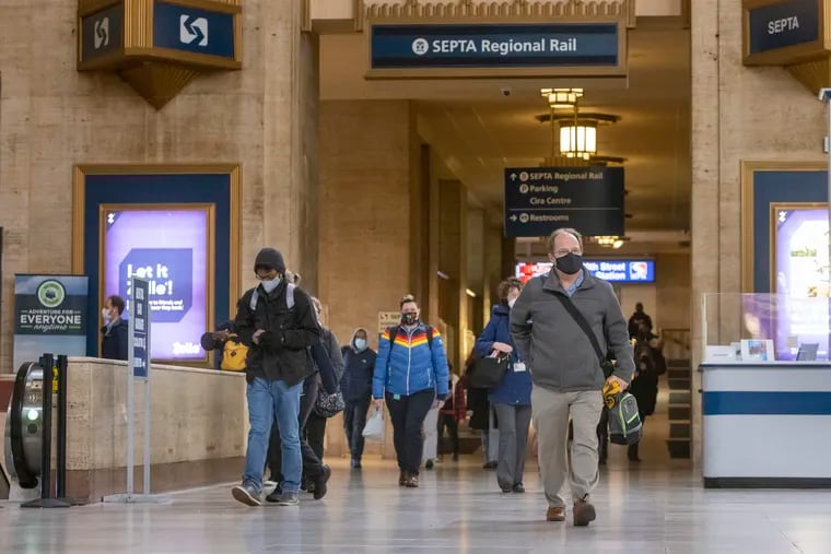 Migrants are to arrive from Texas at 30th Street Station in Philadelphia, shown here, early Wednesday morning. Here commuters are walking in April.