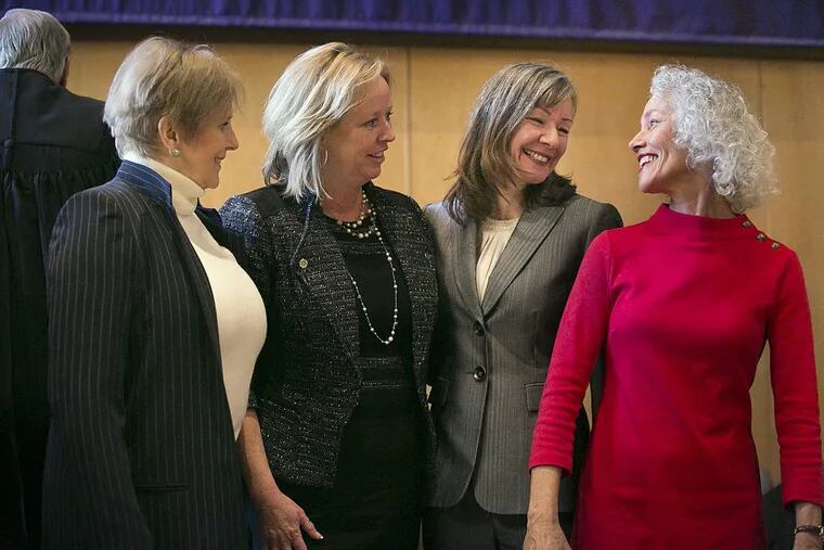 Fearsome Foursome: This all-woman slate made history in November in Chester County as Democrats flipped many local GOP-held seats and drove the kind of high turnout that led to a Democratic surge across the Pennsylvania suburbs.(Left to Right) Patricia Maisano, Treasurer, Margaret Reif, Controller, Yolanda Van de Krol, Clerk of Courts, and Christina VandePol, M.D., Coroner, stand together for a photo after being sworn into office at West Chester University, Wednesday, Jan. 3, 2018. JESSICA GRIFFIN / Staff Photographer