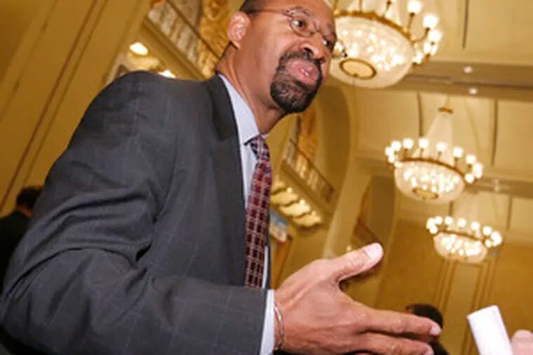 Michael Nutter at a forum of mayoral candidates on Thursday. The event was sponsored by the Greater Philadelphia Chamber of Commerce. Nutter resigned his City Council seat to run for mayor, as is required by the City Charter.
