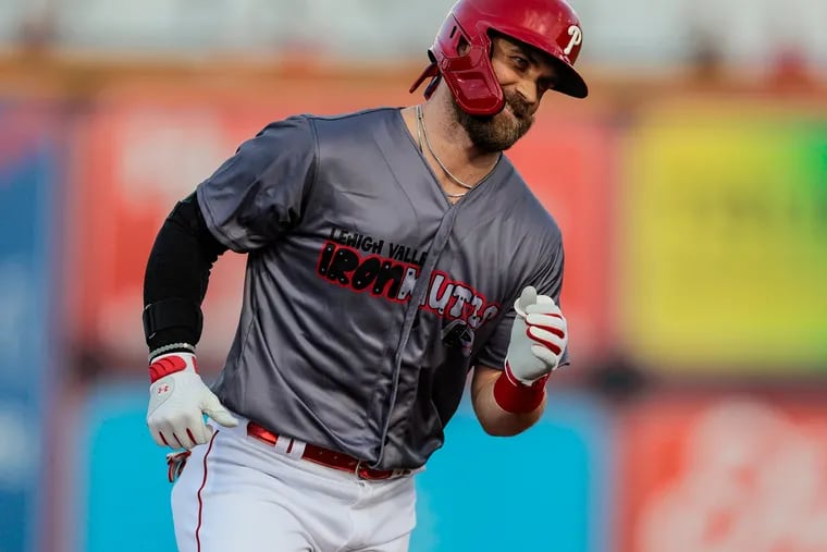 Bryce Harper hit a solo home run against the Gwinnett Stripers in the first at-bat of his rehab assignment on Tuesday.