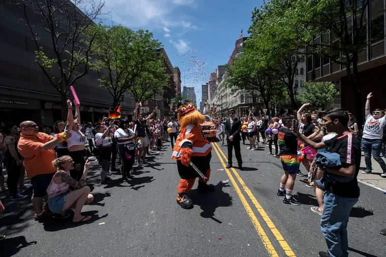 Gritty dances on Market Street during the Philadelphia Gay Pride Parade.