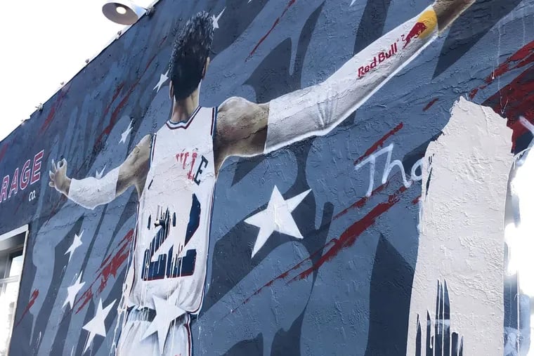Someone threw white paint over Matisse Thybulle's signature on the mural of him on the side of Garage Fishtown over the weekend.
