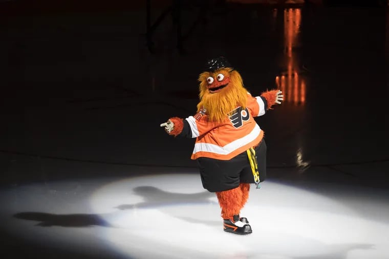 Gritty, the Flyers' new mascot makes his appearance at the home opener after descending from the rafters before the game. The Flyers take the ice in their home opener against the Sharks on Oct. 9, 2018.