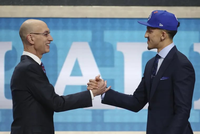NBA Commissioner Adam Silver greets Landry Shamet after he was picked 26th overall by the Philadelphia 76ers during the 2018 NBA Draft. Tonight, the Sixers have the No. 24 pick.