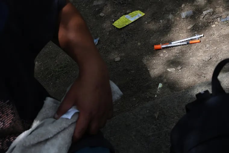 Syringes lay on the ground at McPherson Square in Philadelphia's Kensington section on Aug. 14, 2020.  Overdose deaths have continued to soar during the coronavirus pandemic.