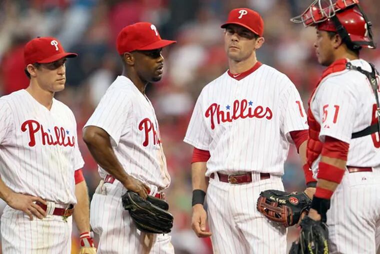 Michael Young, Chase Utley and Jimmy Rollins. (Yong Kim/Staff Photographer)