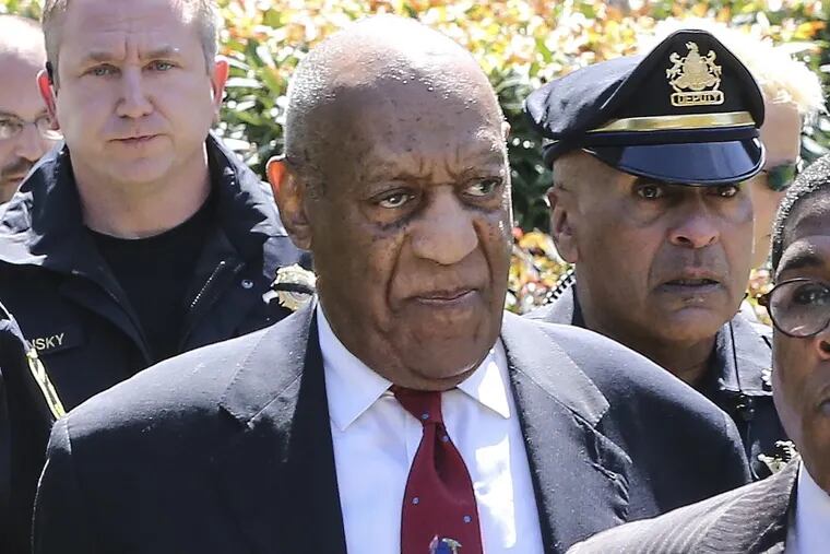 Bill Cosby leaves the Montgomery County Courthouse after being found guilty on all three counts of aggravated indecent asault.
