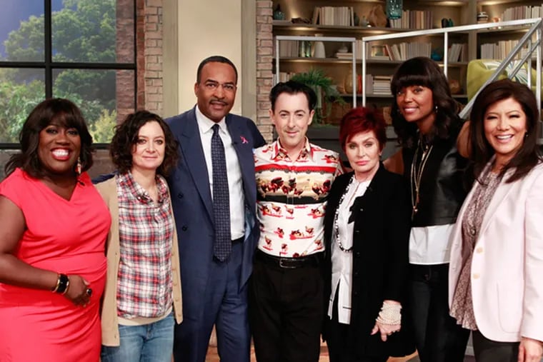 CBS 3's Ukee Washington and Broadway star Alan Cumming pose with the hosts of "The Talk."