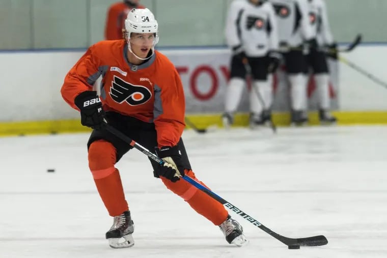 Left winger Oskar Lindblom brings the puck up ice during a drill in the Flyers development camp.