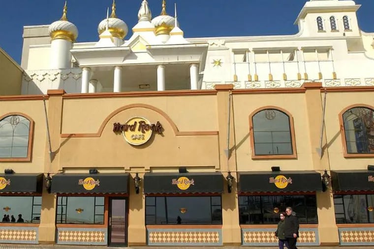 The Hard Rock Cafe at Trump Taj Mahal Hotel & Casino has filed notice that it might close in April. Its parent company says the cafe plans to operate through its current lease, which expires at the end of 2016. The Taj is trying to emerge from bankruptcy under its new owner, investor Carl Icahn. (File photo)