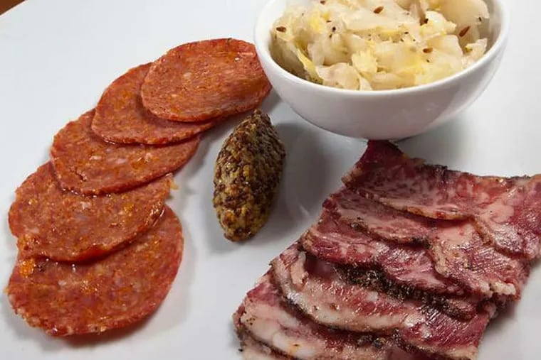 A tasting plate featured salami and pastrami with bread and - what else? - a dish of schmaltz.