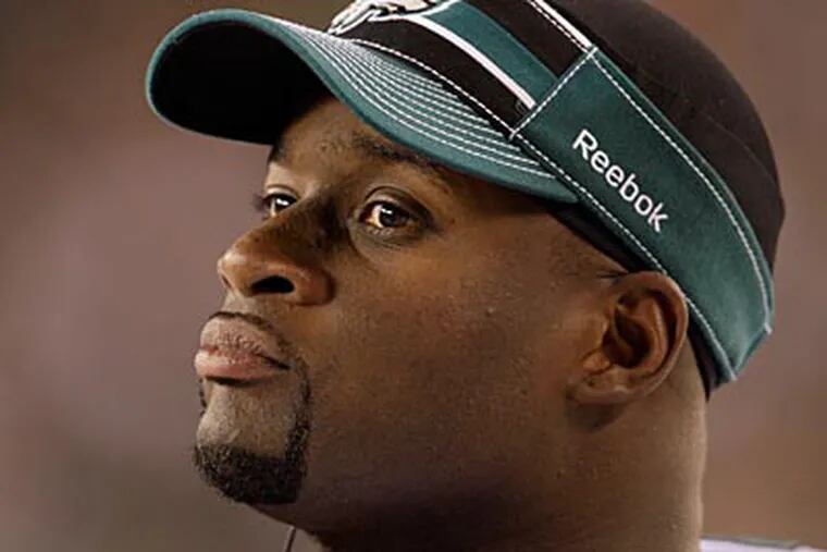 "He's a tough competitive nut," Eagles coach Andy Reid said about Vince Young. (David Maialetti/Staff Photographer)