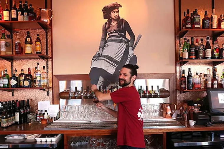 Elliotte Sammartino pours a beer at Brigantessa, which features several Italian craft brews on draft.