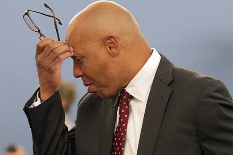 Superintendent of The School District of Philadelphia William Hite scratches his head while arriving to a public meeting to adopt a operating budget for 2014/2015 at the Philadelphia School District Building on Monday, June 30, 2014. The Pa. Senate's action on Tuesday delays a cigarette tax that would raise millions for Philly schools. ( YONG KIM / Staff Photographer )