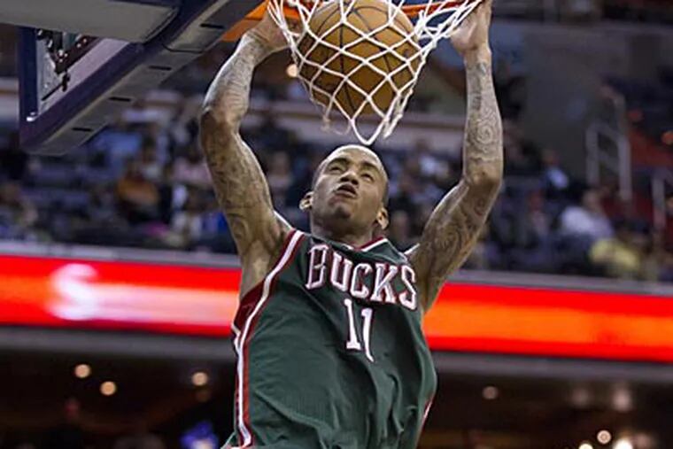 Monta Ellis and the Bucks trail the Sixers by three games for the eighth spot in the East. (Manuel Balce Ceneta/AP)