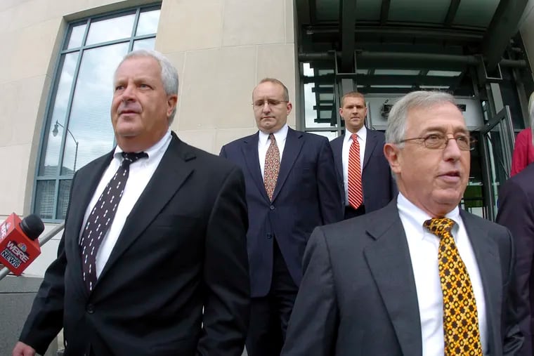 Former Luzerne County Court Judges Michael Conahan (left) and Mark Ciavarella (right), leave the U.S. District Courthouse in Scranton, Pa., on Sept. 15, 2009.