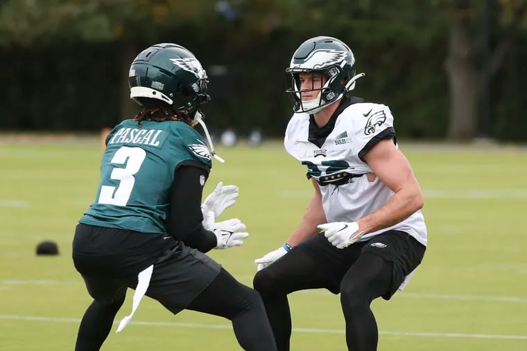 Eagles safety Reed Blankenship (32) runs a drill with wide receiver Zach Pascal (3) during practice at the NovaCare Complex in South Philadelphia on Thursday, Oct. 13, 2022.