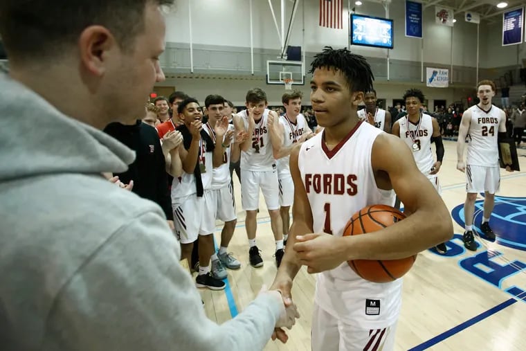 Haverford School guard Jameer Nelson receives his gold medal after the Fords won the PAISAA boys' basketball championship in February.
