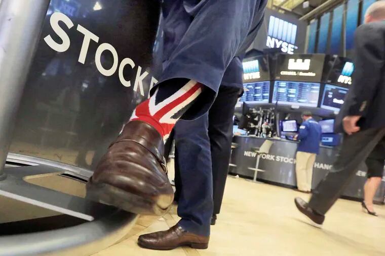 Stocks specialist Michael Pistillo sported Union Jack socks while working on the floor of the New York Stock Exchange on Friday.