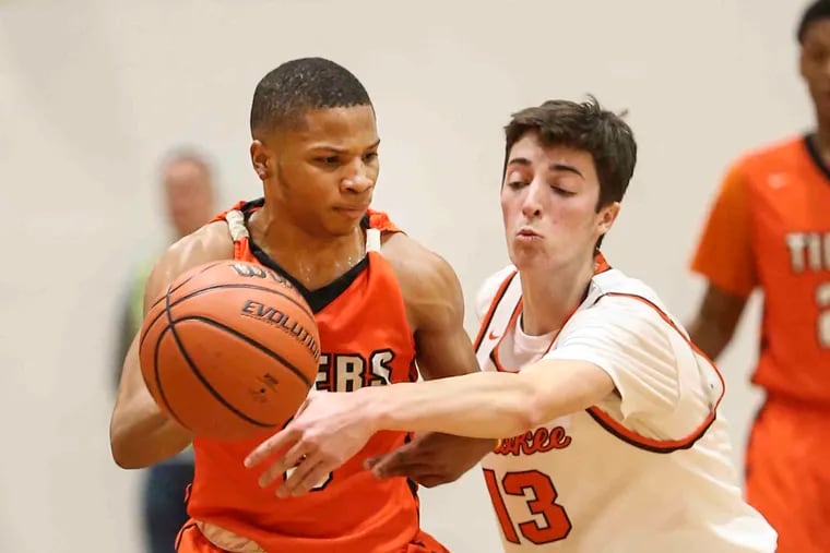 Cherokee's Anthony DiCaro (right, shown in a game earlier this season vs. Woodrow Wilson) scored 17 in his final outing for the Chiefs.