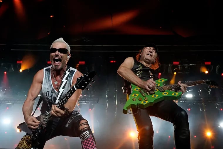 Rudolf Schenker, left, and Matthias Jabs of the band Scorpions perform at the Rock in Rio music festival in Rio de Janeiro, Brazil, early Saturday, Oct. 5, 2019. (AP Photo/Leo Correa)